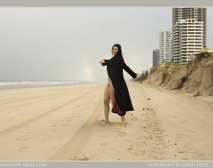 Bib boobed babe showing her body on the beach