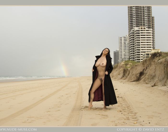 Bib boobed babe showing her body on the beach