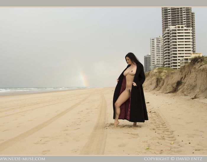 Bib boobed babe showing her body on the beach