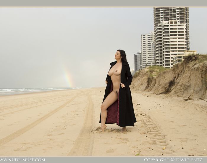 Bib boobed babe showing her body on the beach