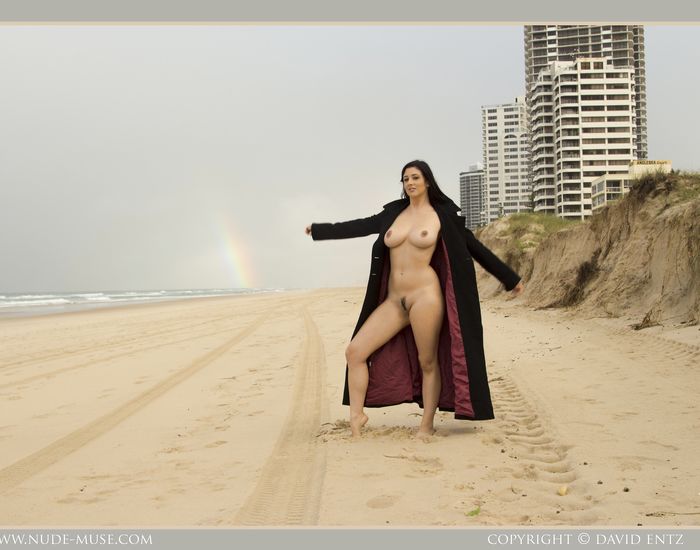Bib boobed babe showing her body on the beach