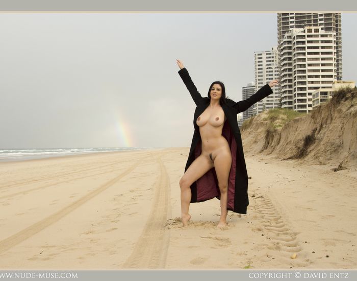 Bib boobed babe showing her body on the beach
