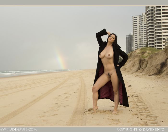 Bib boobed babe showing her body on the beach