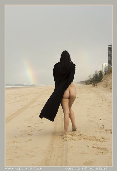 Bib boobed babe showing her body on the beach