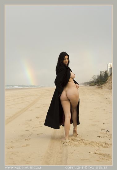 Bib boobed babe showing her body on the beach