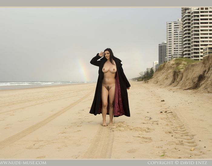 Bib boobed babe showing her body on the beach