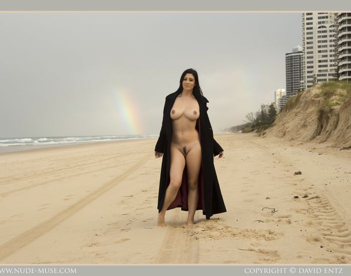 Bib boobed babe showing her body on the beach