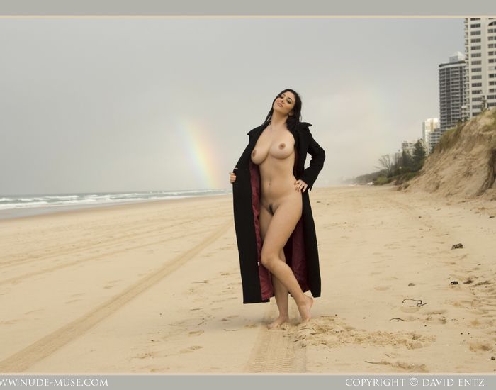 Bib boobed babe showing her body on the beach