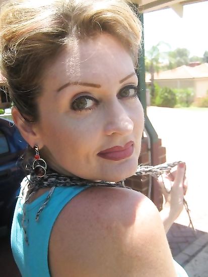 Big boobs mature lady teasing the cam in a solo gallery